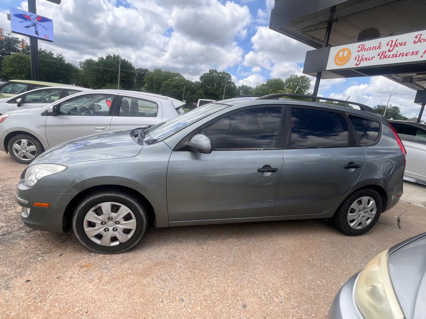 2010 GRAY HYUNDAI ELANTRA TOURING GLS; GLS Automatic (KMHDC8AE3AU) with an 2.0L L4 DOHC 16V engine, 4-Speed Automatic transmission, located at 8101 E. Skelly Dr., Tulsa, OK, 74129, (918) 592-3593, 36.121891, -95.888802 - Photo#1